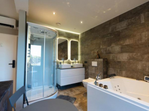 Luxe kamer met jacuzzi bij B&B Gezond aan Zee - Toegang Wellnesstuin meerprijs